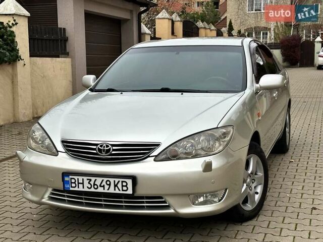 Серый Тойота Камри, объемом двигателя 2.36 л и пробегом 257 тыс. км за 8300 $, фото 3 на Automoto.ua