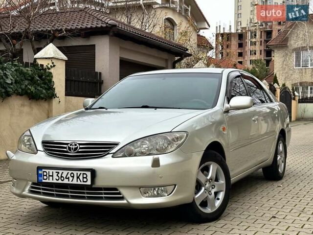 Серый Тойота Камри, объемом двигателя 2.36 л и пробегом 257 тыс. км за 8300 $, фото 5 на Automoto.ua