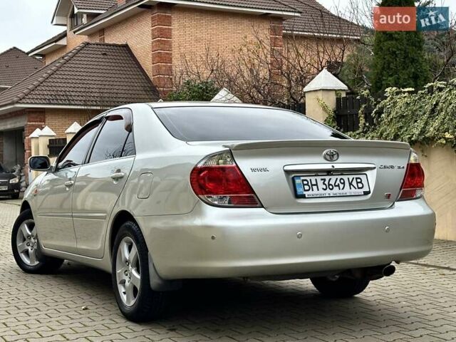 Серый Тойота Камри, объемом двигателя 2.36 л и пробегом 257 тыс. км за 8300 $, фото 24 на Automoto.ua