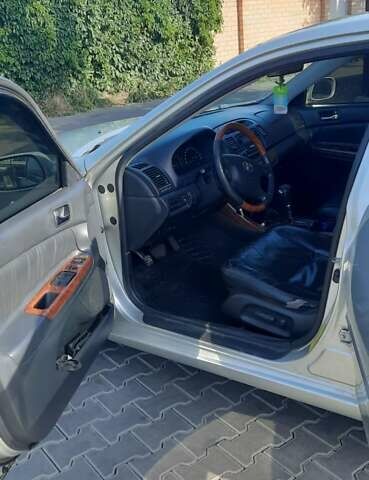 Серый Тойота Камри, объемом двигателя 3 л и пробегом 398 тыс. км за 4900 $, фото 32 на Automoto.ua