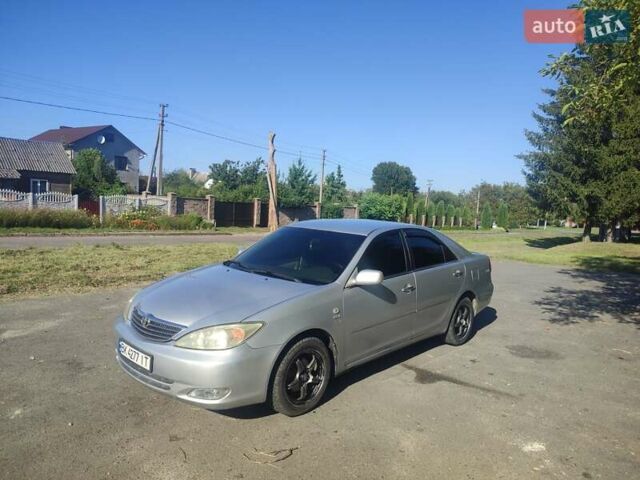 Серый Тойота Камри, объемом двигателя 2.36 л и пробегом 308 тыс. км за 4500 $, фото 1 на Automoto.ua