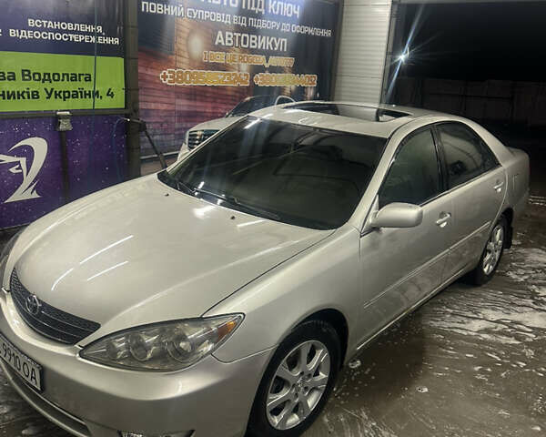 Сірий Тойота Камрі, об'ємом двигуна 3 л та пробігом 242 тис. км за 4300 $, фото 5 на Automoto.ua