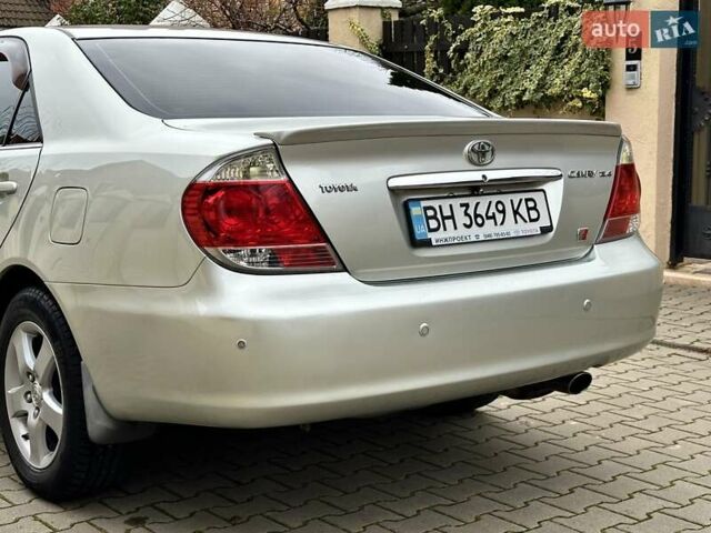 Серый Тойота Камри, объемом двигателя 2.36 л и пробегом 257 тыс. км за 8300 $, фото 26 на Automoto.ua