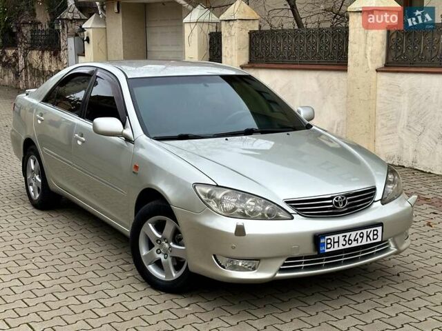 Серый Тойота Камри, объемом двигателя 2.36 л и пробегом 257 тыс. км за 8300 $, фото 17 на Automoto.ua