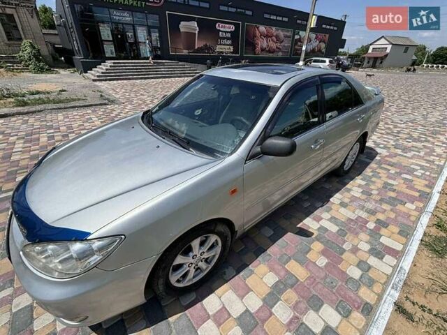 Серый Тойота Камри, объемом двигателя 3 л и пробегом 208 тыс. км за 6500 $, фото 1 на Automoto.ua