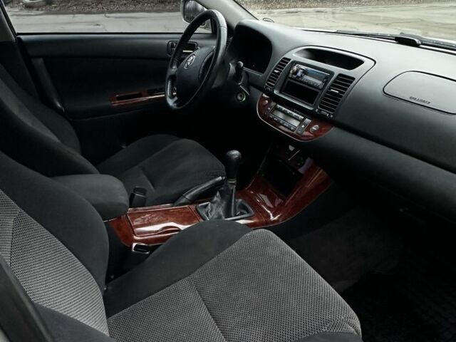 Сірий Тойота Камрі, об'ємом двигуна 2.4 л та пробігом 302 тис. км за 5800 $, фото 10 на Automoto.ua