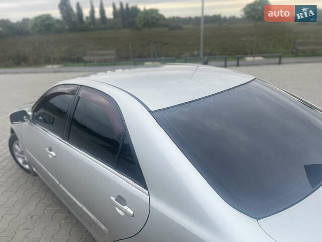 Серый Тойота Камри, объемом двигателя 2.4 л и пробегом 469 тыс. км за 6200 $, фото 9 на Automoto.ua