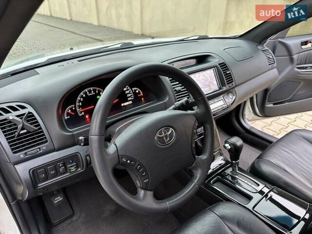 Серый Тойота Камри, объемом двигателя 2.36 л и пробегом 257 тыс. км за 8300 $, фото 50 на Automoto.ua