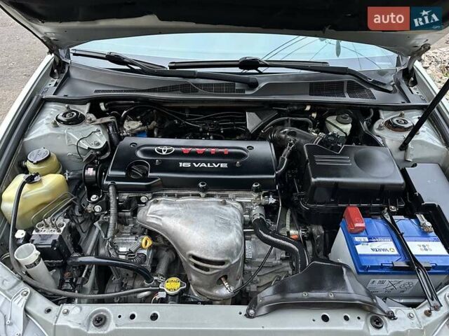 Серый Тойота Камри, объемом двигателя 2.36 л и пробегом 257 тыс. км за 8300 $, фото 69 на Automoto.ua