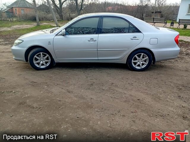 Сірий Тойота Камрі, об'ємом двигуна 2.4 л та пробігом 266 тис. км за 6750 $, фото 4 на Automoto.ua