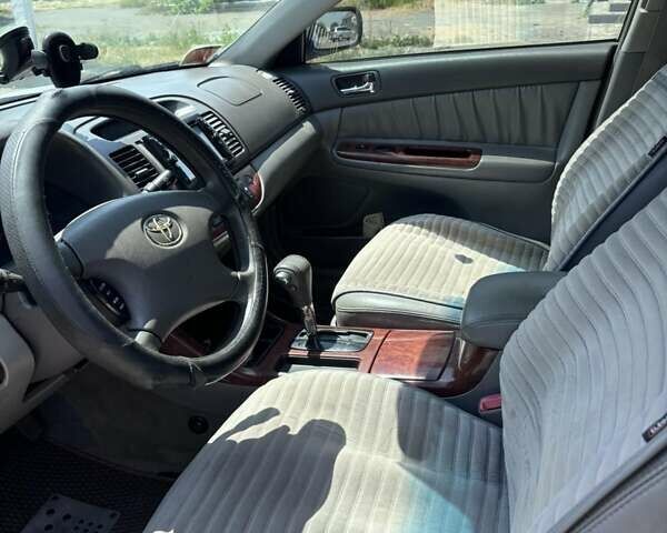 Серый Тойота Камри, объемом двигателя 3 л и пробегом 208 тыс. км за 6500 $, фото 7 на Automoto.ua