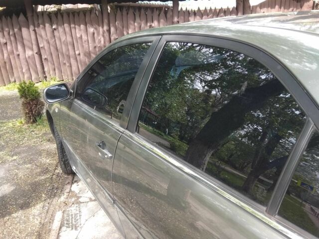 Серый Тойота Камри, объемом двигателя 2.4 л и пробегом 360 тыс. км за 4800 $, фото 4 на Automoto.ua