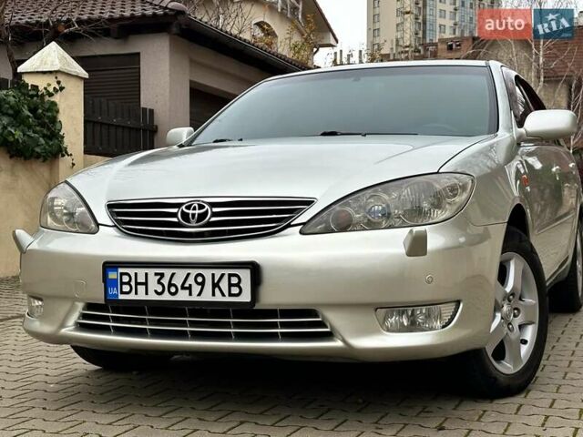 Серый Тойота Камри, объемом двигателя 2.36 л и пробегом 257 тыс. км за 8300 $, фото 6 на Automoto.ua