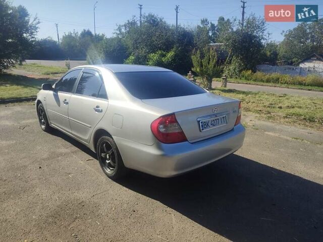 Серый Тойота Камри, объемом двигателя 2.36 л и пробегом 308 тыс. км за 4500 $, фото 3 на Automoto.ua