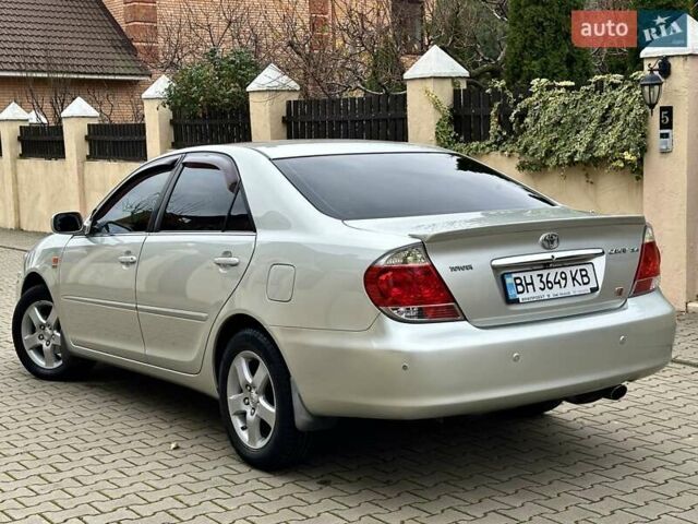 Серый Тойота Камри, объемом двигателя 2.36 л и пробегом 257 тыс. км за 8300 $, фото 22 на Automoto.ua