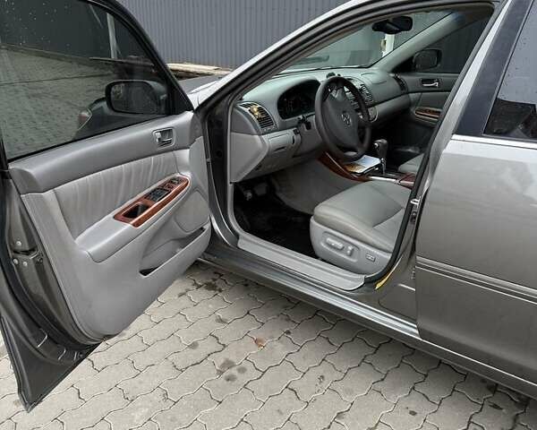 Сірий Тойота Камрі, об'ємом двигуна 3 л та пробігом 362 тис. км за 5650 $, фото 2 на Automoto.ua