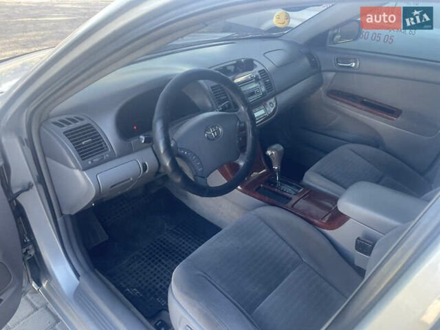 Серый Тойота Камри, объемом двигателя 2.4 л и пробегом 469 тыс. км за 6200 $, фото 15 на Automoto.ua