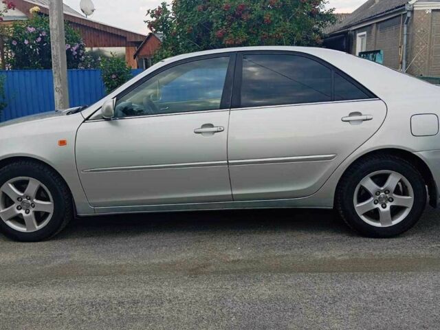 Серый Тойота Камри, объемом двигателя 3 л и пробегом 338 тыс. км за 5350 $, фото 2 на Automoto.ua