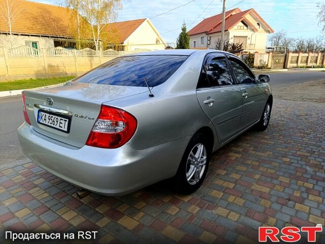 Серый Тойота Камри, объемом двигателя 2.4 л и пробегом 336 тыс. км за 6500 $, фото 3 на Automoto.ua