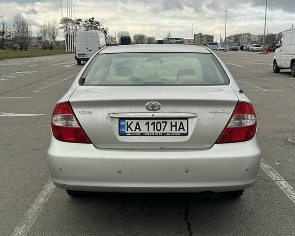 Серый Тойота Камри, объемом двигателя 2.4 л и пробегом 229 тыс. км за 3800 $, фото 3 на Automoto.ua