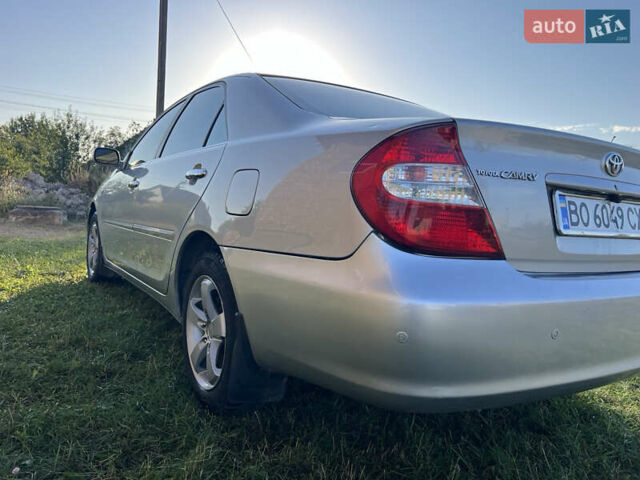 Серый Тойота Камри, объемом двигателя 2.4 л и пробегом 300 тыс. км за 4000 $, фото 3 на Automoto.ua