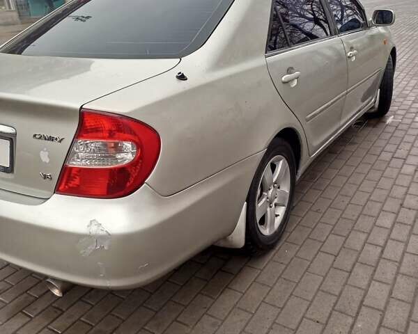 Серый Тойота Камри, объемом двигателя 3 л и пробегом 683 тыс. км за 4300 $, фото 6 на Automoto.ua