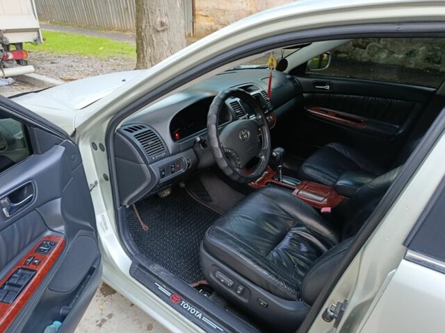 Сірий Тойота Камрі, об'ємом двигуна 3 л та пробігом 210 тис. км за 7200 $, фото 12 на Automoto.ua