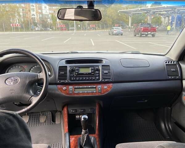Серый Тойота Камри, объемом двигателя 2.36 л и пробегом 294 тыс. км за 5199 $, фото 5 на Automoto.ua