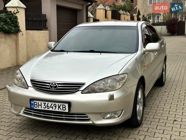 Серый Тойота Камри, объемом двигателя 2.36 л и пробегом 257 тыс. км за 8300 $, фото 29 на Automoto.ua