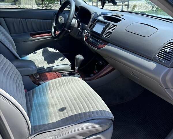 Серый Тойота Камри, объемом двигателя 3 л и пробегом 208 тыс. км за 6500 $, фото 13 на Automoto.ua