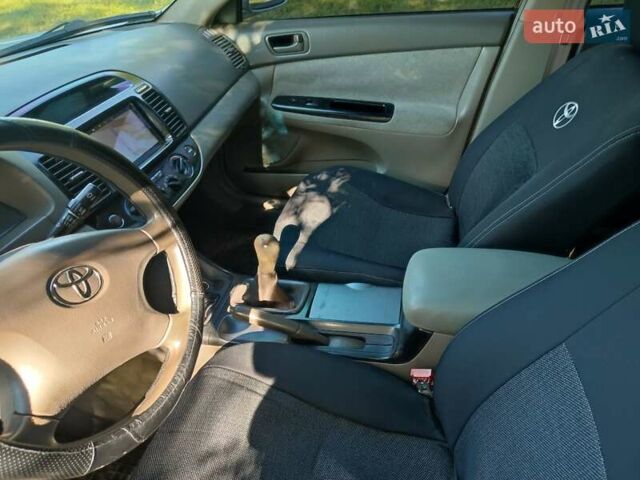 Серый Тойота Камри, объемом двигателя 2.36 л и пробегом 308 тыс. км за 4500 $, фото 7 на Automoto.ua