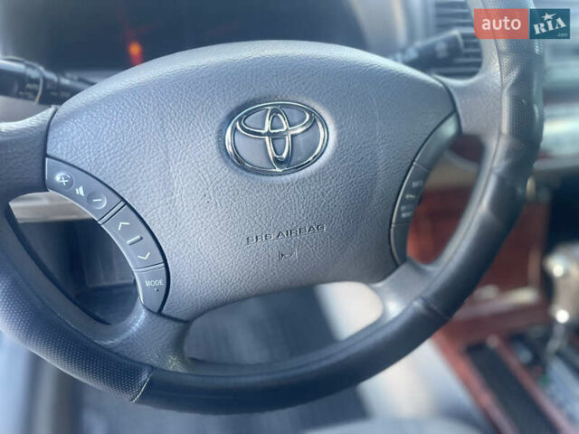 Серый Тойота Камри, объемом двигателя 2.4 л и пробегом 469 тыс. км за 6200 $, фото 17 на Automoto.ua