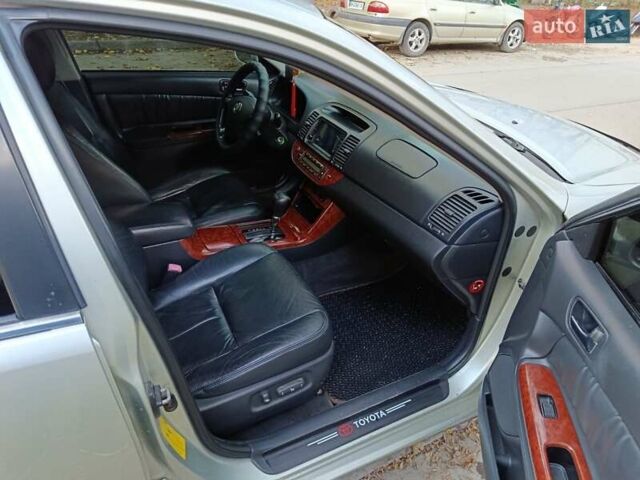 Сірий Тойота Камрі, об'ємом двигуна 3 л та пробігом 210 тис. км за 7200 $, фото 12 на Automoto.ua