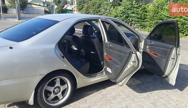 Серый Тойота Камри, объемом двигателя 3 л и пробегом 398 тыс. км за 4900 $, фото 31 на Automoto.ua