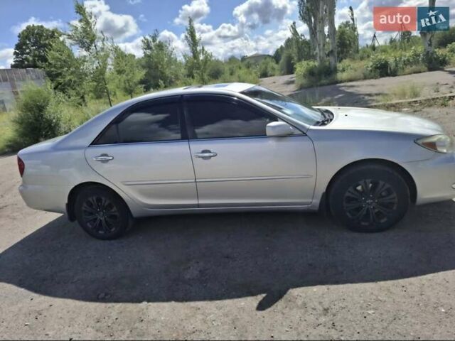 Серый Тойота Камри, объемом двигателя 3 л и пробегом 390 тыс. км за 6200 $, фото 7 на Automoto.ua