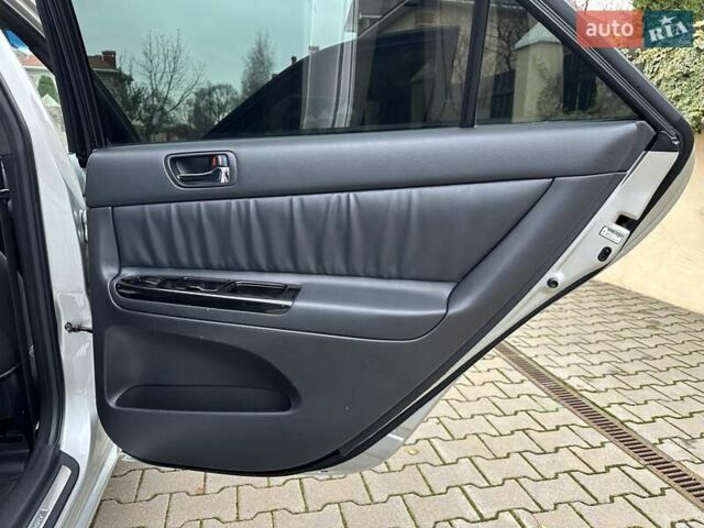 Серый Тойота Камри, объемом двигателя 2.36 л и пробегом 257 тыс. км за 8300 $, фото 57 на Automoto.ua