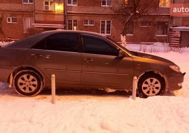 Серый Тойота Камри, объемом двигателя 2.36 л и пробегом 150 тыс. км за 5000 $, фото 7 на Automoto.ua