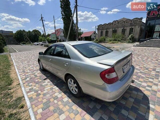 Серый Тойота Камри, объемом двигателя 3 л и пробегом 208 тыс. км за 6500 $, фото 2 на Automoto.ua