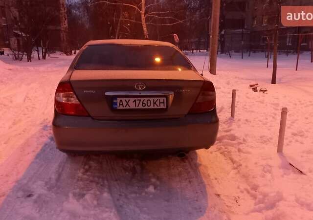 Серый Тойота Камри, объемом двигателя 2.36 л и пробегом 150 тыс. км за 5000 $, фото 2 на Automoto.ua