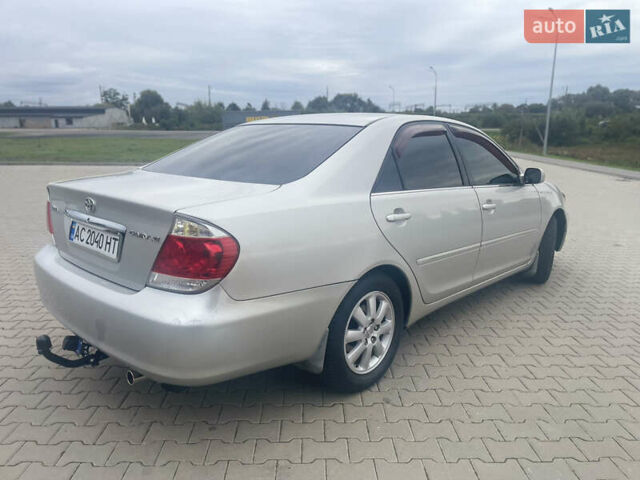 Серый Тойота Камри, объемом двигателя 2.4 л и пробегом 469 тыс. км за 6200 $, фото 5 на Automoto.ua