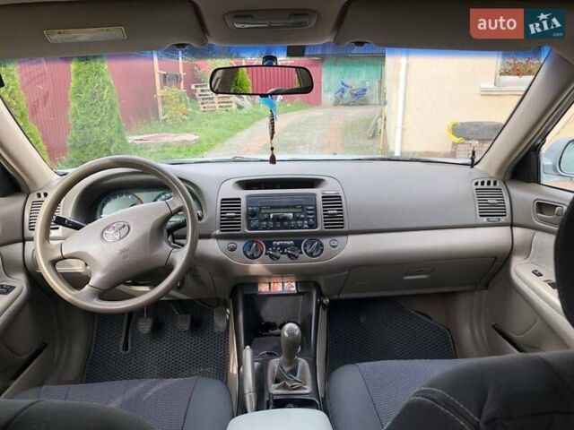 Серый Тойота Камри, объемом двигателя 2.4 л и пробегом 201 тыс. км за 5900 $, фото 3 на Automoto.ua