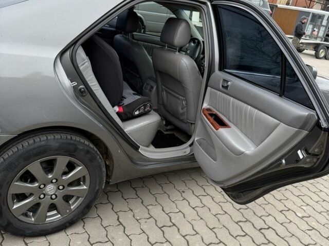 Сірий Тойота Камрі, об'ємом двигуна 3 л та пробігом 361 тис. км за 5500 $, фото 5 на Automoto.ua