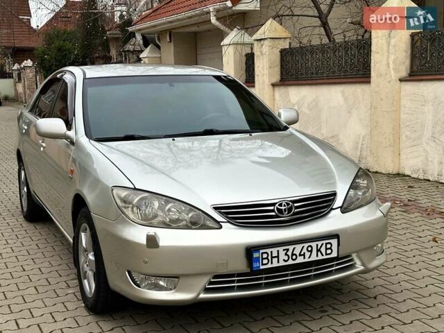 Серый Тойота Камри, объемом двигателя 2.36 л и пробегом 257 тыс. км за 8300 $, фото 30 на Automoto.ua