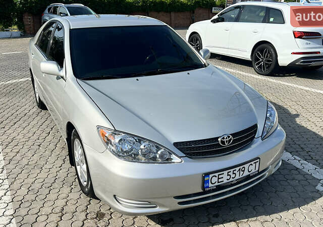 Сірий Тойота Камрі, об'ємом двигуна 2.4 л та пробігом 255 тис. км за 6470 $, фото 2 на Automoto.ua