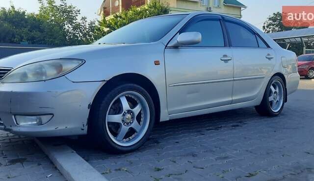 Серый Тойота Камри, объемом двигателя 3 л и пробегом 398 тыс. км за 4900 $, фото 1 на Automoto.ua