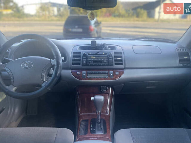 Серый Тойота Камри, объемом двигателя 2.4 л и пробегом 469 тыс. км за 6200 $, фото 25 на Automoto.ua