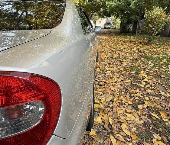 Сірий Тойота Камрі, об'ємом двигуна 3 л та пробігом 242 тис. км за 6200 $, фото 2 на Automoto.ua