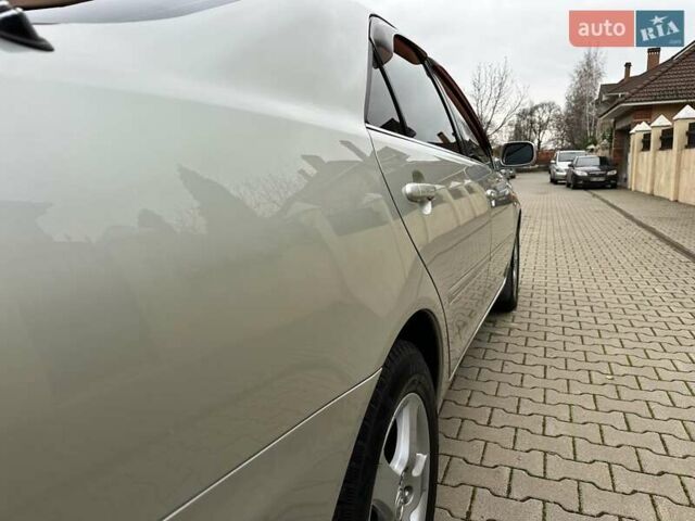 Серый Тойота Камри, объемом двигателя 2.36 л и пробегом 257 тыс. км за 8300 $, фото 41 на Automoto.ua