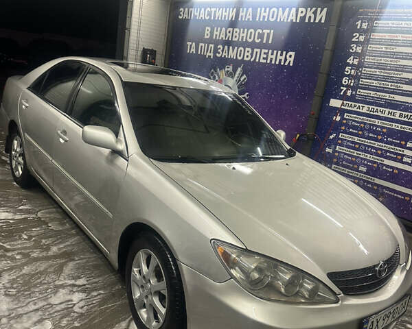 Сірий Тойота Камрі, об'ємом двигуна 3 л та пробігом 242 тис. км за 4300 $, фото 2 на Automoto.ua