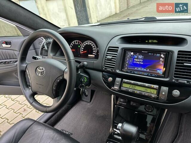Серый Тойота Камри, объемом двигателя 2.36 л и пробегом 257 тыс. км за 8300 $, фото 65 на Automoto.ua